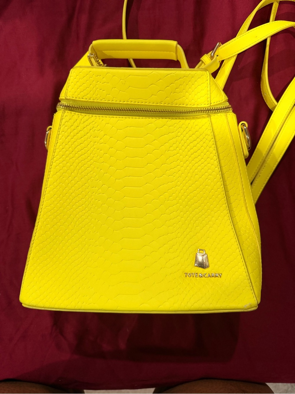 Tote & Carry Yellow Faux-Snakeskin Backpack